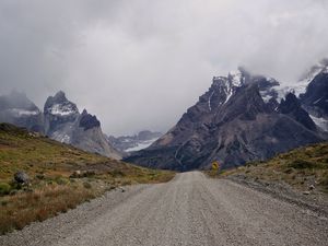 Preview wallpaper road, mountains, distance, snow, snowy