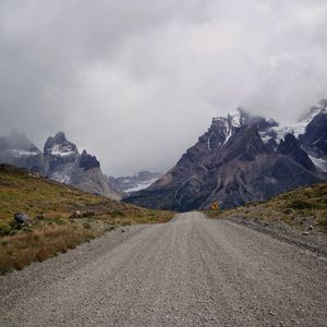 Preview wallpaper road, mountains, distance, snow, snowy