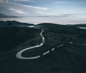 Preview wallpaper road, mountains, fog, winding