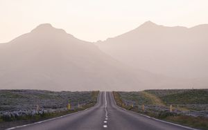 Preview wallpaper road, mountains, fog, asphalt, highway