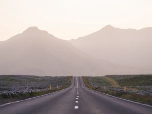 Preview wallpaper road, mountains, fog, asphalt, highway