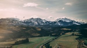 Preview wallpaper road, mountains, hills, snowy, landscape