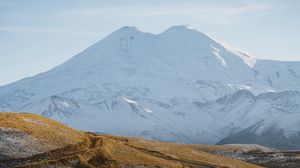 Preview wallpaper road, mountains, hills, snow, snowy