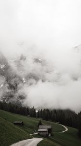 Preview wallpaper road, mountains, hills, trees, houses, clouds, nature