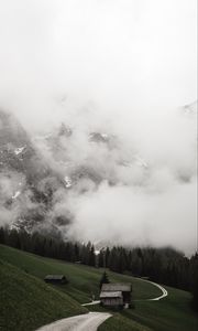 Preview wallpaper road, mountains, hills, trees, houses, clouds, nature