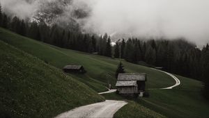 Preview wallpaper road, mountains, hills, trees, houses, clouds, nature