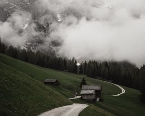 Preview wallpaper road, mountains, hills, trees, houses, clouds, nature