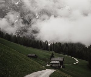 Preview wallpaper road, mountains, hills, trees, houses, clouds, nature