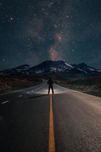 Preview wallpaper road, mountains, night, silhouette, starry sky