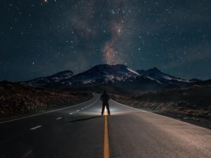 Preview wallpaper road, mountains, night, silhouette, starry sky