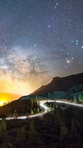 Preview wallpaper road, mountains, night, lights, stars