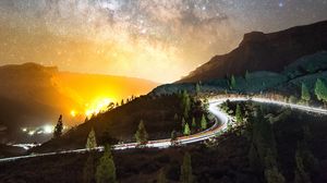 Preview wallpaper road, mountains, night, lights, stars