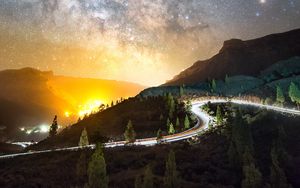 Preview wallpaper road, mountains, night, lights, stars