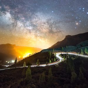 Preview wallpaper road, mountains, night, lights, stars