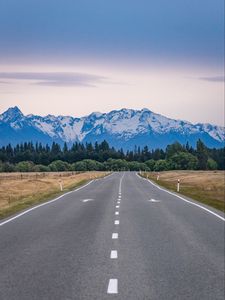 Preview wallpaper road, mountains, rocks, snow, distance