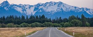 Preview wallpaper road, mountains, rocks, snow, distance