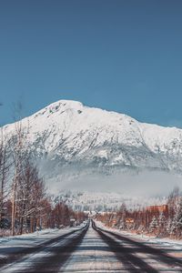 Preview wallpaper road, mountains, snow, trees, landscape, winter