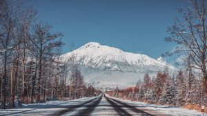 Preview wallpaper road, mountains, snow, trees, landscape, winter