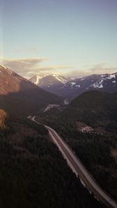 Preview wallpaper road, mountains, snow, snowy, trees