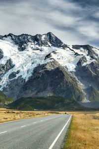 Preview wallpaper road, mountains, snow, plain