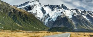 Preview wallpaper road, mountains, snow, plain