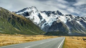 Preview wallpaper road, mountains, snow, plain