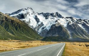 Preview wallpaper road, mountains, snow, plain