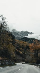 Preview wallpaper road, mountains, turn, trees, clouds