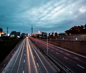 Preview wallpaper road, movement, city, evening