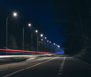 Preview wallpaper road, night, lanterns, light