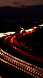 Preview wallpaper road, night, traffic, turn, sign