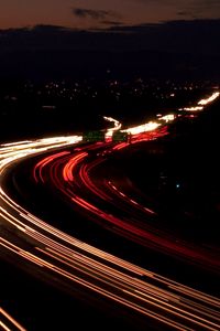 Preview wallpaper road, night, traffic, turn, sign