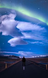 Preview wallpaper road, northern lights, starry sky, markings, man