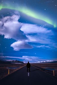 Preview wallpaper road, northern lights, starry sky, markings, man