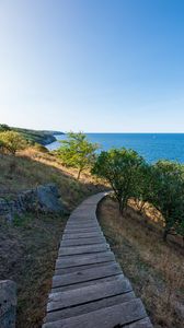 Preview wallpaper road, path, slope, sea, horizon