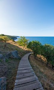 Preview wallpaper road, path, slope, sea, horizon