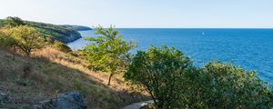 Preview wallpaper road, path, slope, sea, horizon