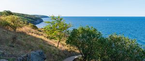Preview wallpaper road, path, slope, sea, horizon