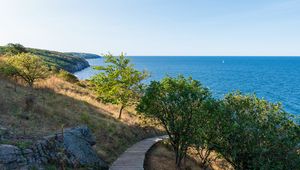 Preview wallpaper road, path, slope, sea, horizon