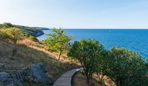Preview wallpaper road, path, slope, sea, horizon