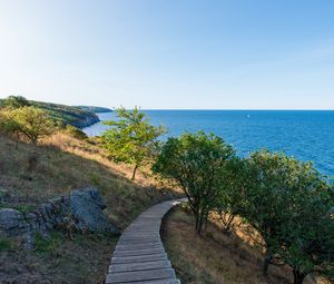 Preview wallpaper road, path, slope, sea, horizon