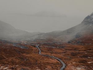 Preview wallpaper road, relief, fog, winding, snowy