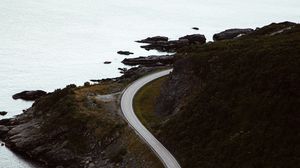Preview wallpaper road, rocks, aerial view, sea