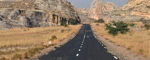 Preview wallpaper road, rocks, grass, dry, nature