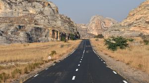 Preview wallpaper road, rocks, grass, dry, nature