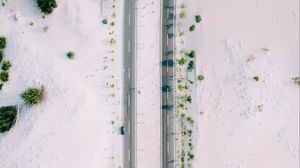 Preview wallpaper road, sand, aerial view, car, bushes