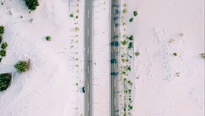 Preview wallpaper road, sand, aerial view, car, bushes