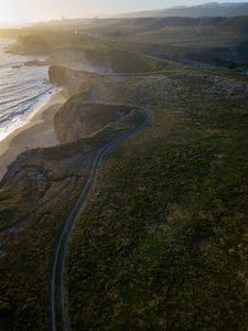 Preview wallpaper road, sea, coast, hills, nature