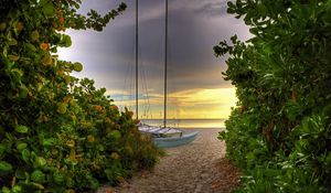 Preview wallpaper road, sea, yacht, greens, sand, beach, mast