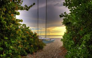 Preview wallpaper road, sea, yacht, greens, sand, beach, mast